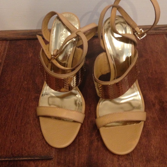 Coach heeled sandal with gold embellishment