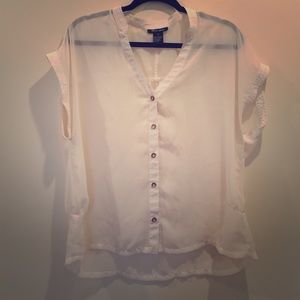 Sheer cream colored blouse