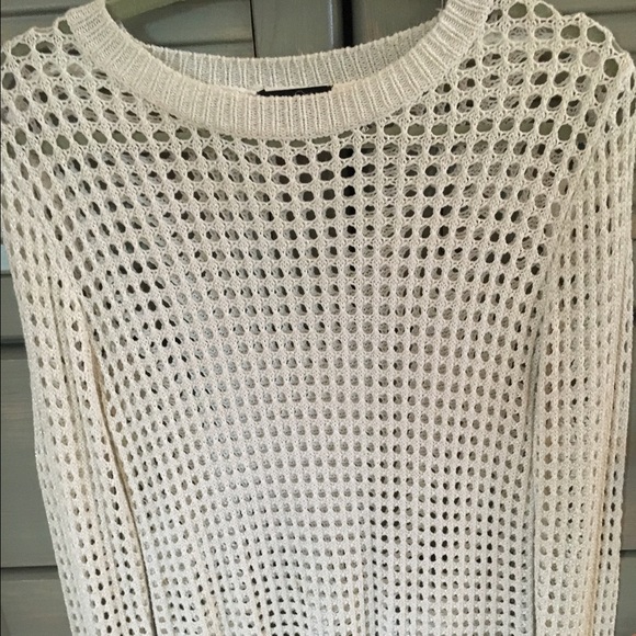 White sweater with gold accent