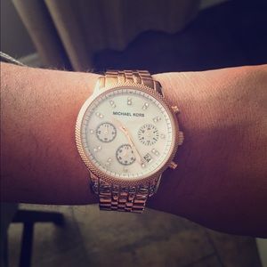 Rose gold Michael Kors watch.