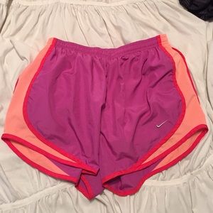 Fuchsia, orange, and red Nike Shorts