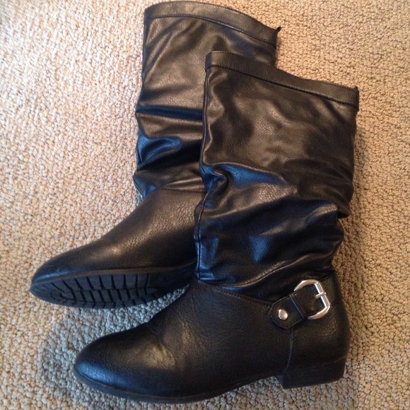 Black boots with silver buckle