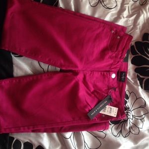 Deep burgundy skinny jeans