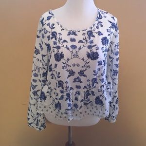 Blue and white floral blouse.