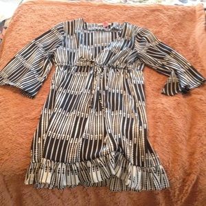 Cute back and white mini dress with sleeves.