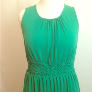 Jelly green dress with unique waistline.