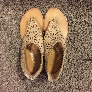 Tan colored sandals, worn once