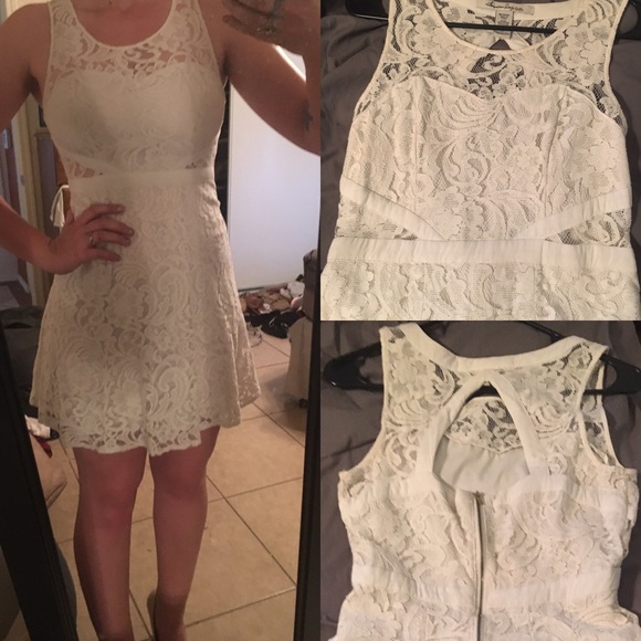 White lace dress with cutouts