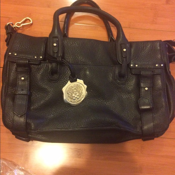 A black pocketbook Vince Camuto