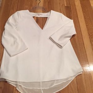 White top with sheer underlay