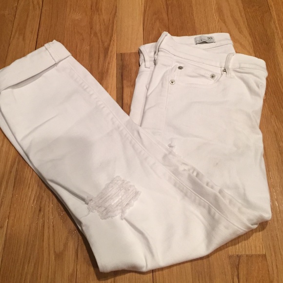 White gap jeans with cuffed ankles and knee tears
