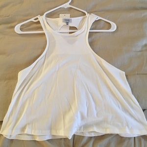 White/cream top with heart shaped back, never worn