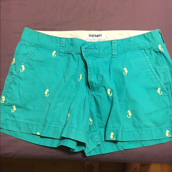 Green with seahorse print shorts