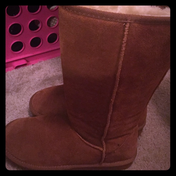 Brand new Leather boots styled like uggs