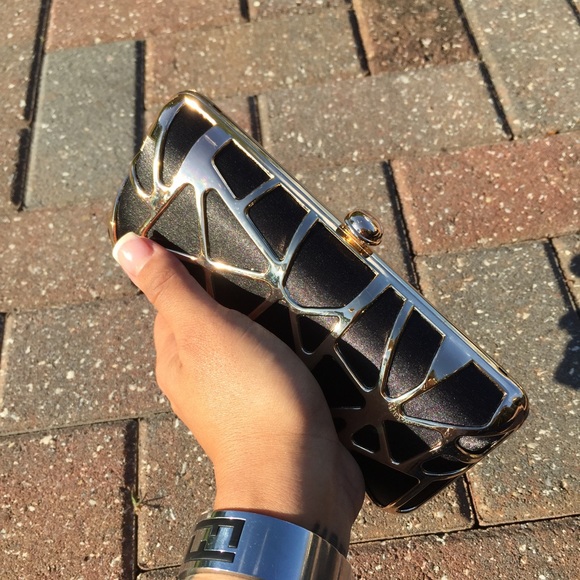 Sephora black and gold clutch