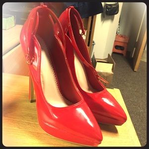 Brand new out of the box never worn Red heels