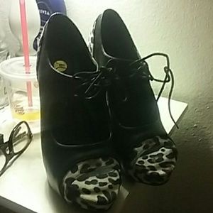 Open toe high heels.