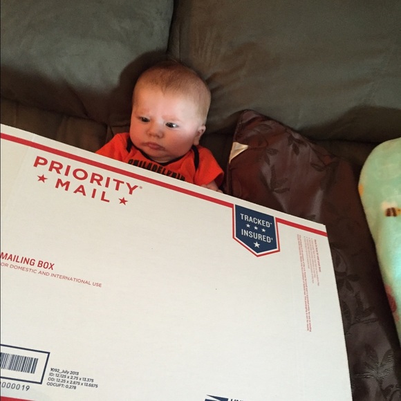 MY Three month old son helping mommy w packages!