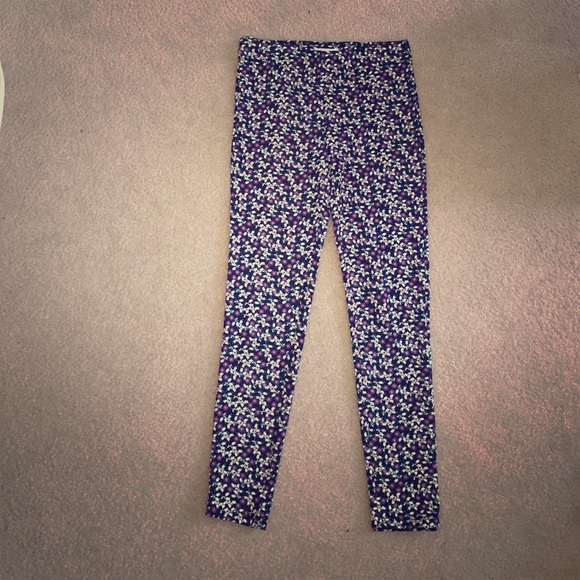 Flowery thick material leggings. Never been worn.