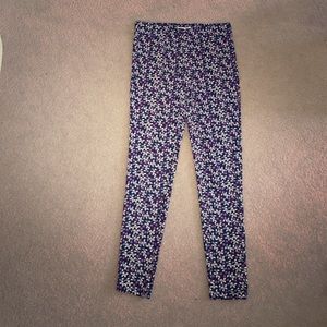 Flowery thick material leggings. Never been worn.