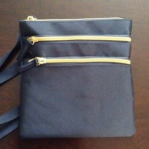 Crossbody Navy purse.