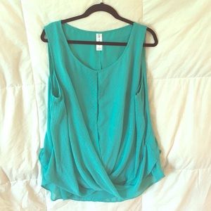 Turquoise sleeveless blouse