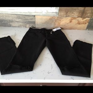 Distressed Black denim jeans