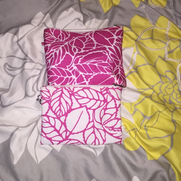 two matching Clinique makeup bags