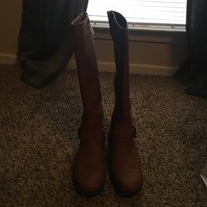 A pair of knee high boots