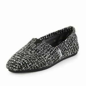 TOMS boucle black and white slip on