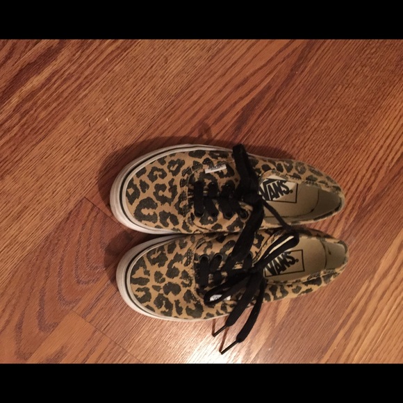 Leopard print vans.