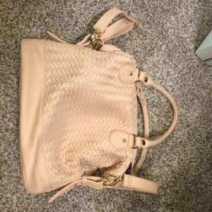Light peach colored handbag