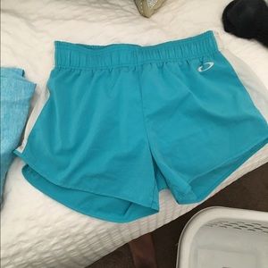 Teal Oakley shorts. Never worn. NWOT