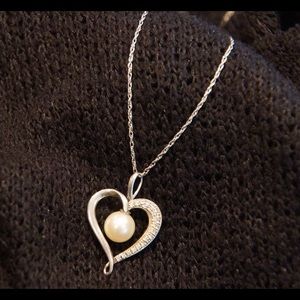 Heart shaped pearl and diamond necklace