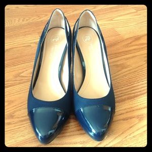Navy blue two inch heels. Worn never.