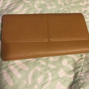 Tan or light brown wallet