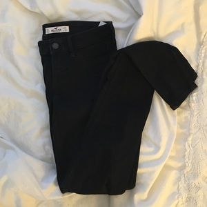 Size 24 black skinny jeans (never worn)