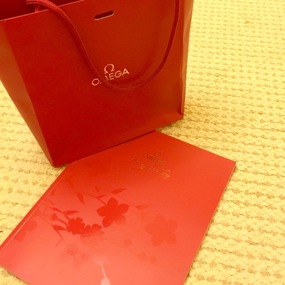 Omega store bag and fine jewelry/watches book