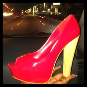 Red patent leather pumps