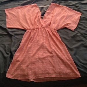 Deep V dress never been worn.