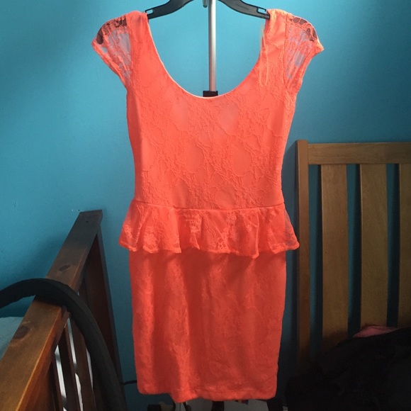 Deep back cut lace peplum dress