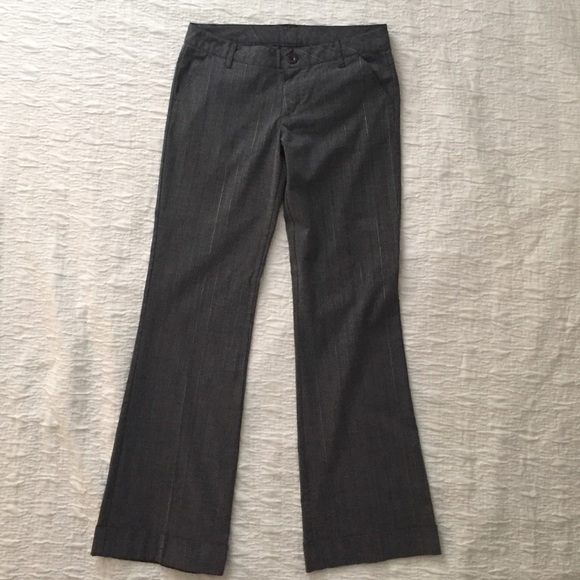 Pants - 63% polyester, 34% rayon, 3% spandex