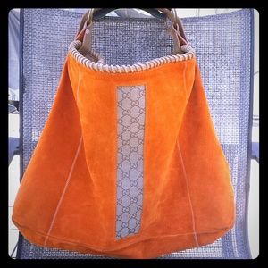 Orange suede hobo bag