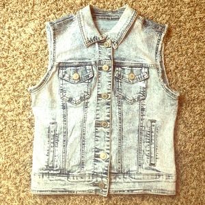 Distressed denim vest