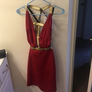 Red and gold cut out dress