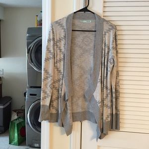 Maurice's light grey cardigan