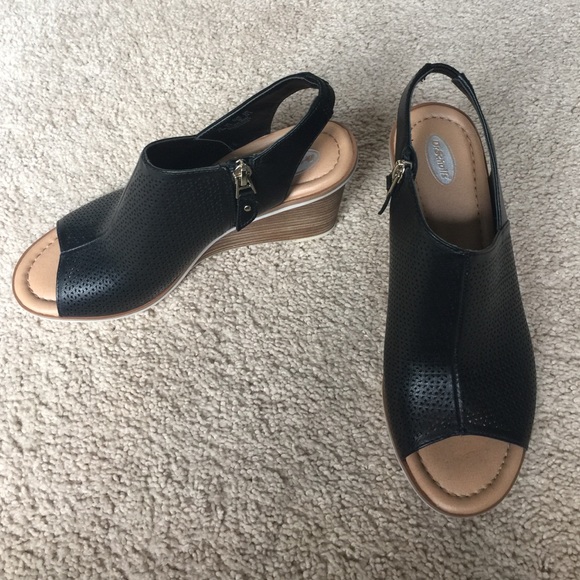 Open toe black wedges.