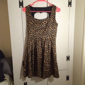 Cheetah print dress with a cut out heart back