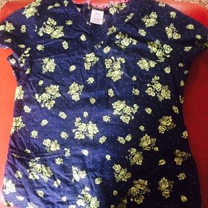 Scrub top, Dark blue with grn/yllw flower print.