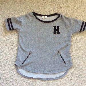 Gently used. Shorter in the front, longer in back.